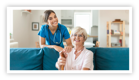 Bethany Village Home Health Care nurse posing with client on couch