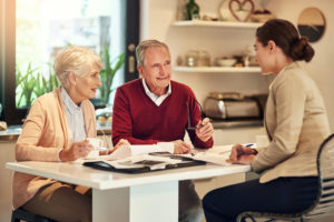 Shot of a senior couple getting advice from their financial consultant