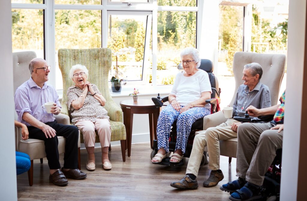 A group of seniors sitting together in a retirement community