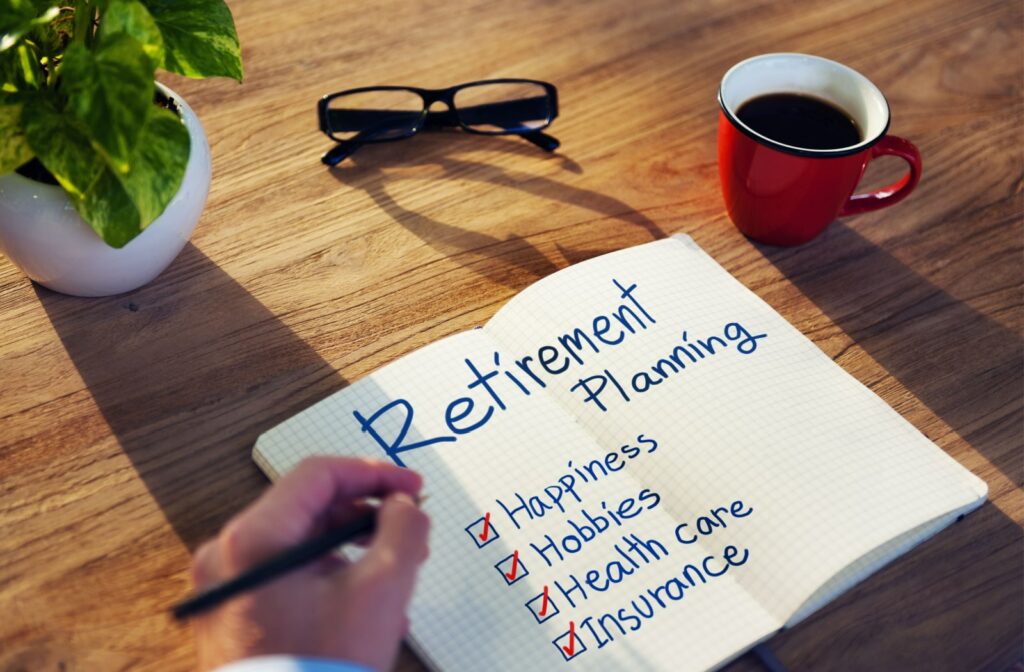 A checklist of a retirement plan written in a notebook.