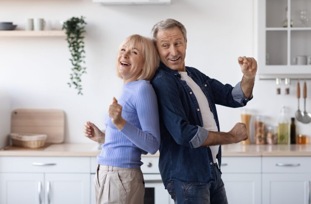 A mature couple happy in their home.