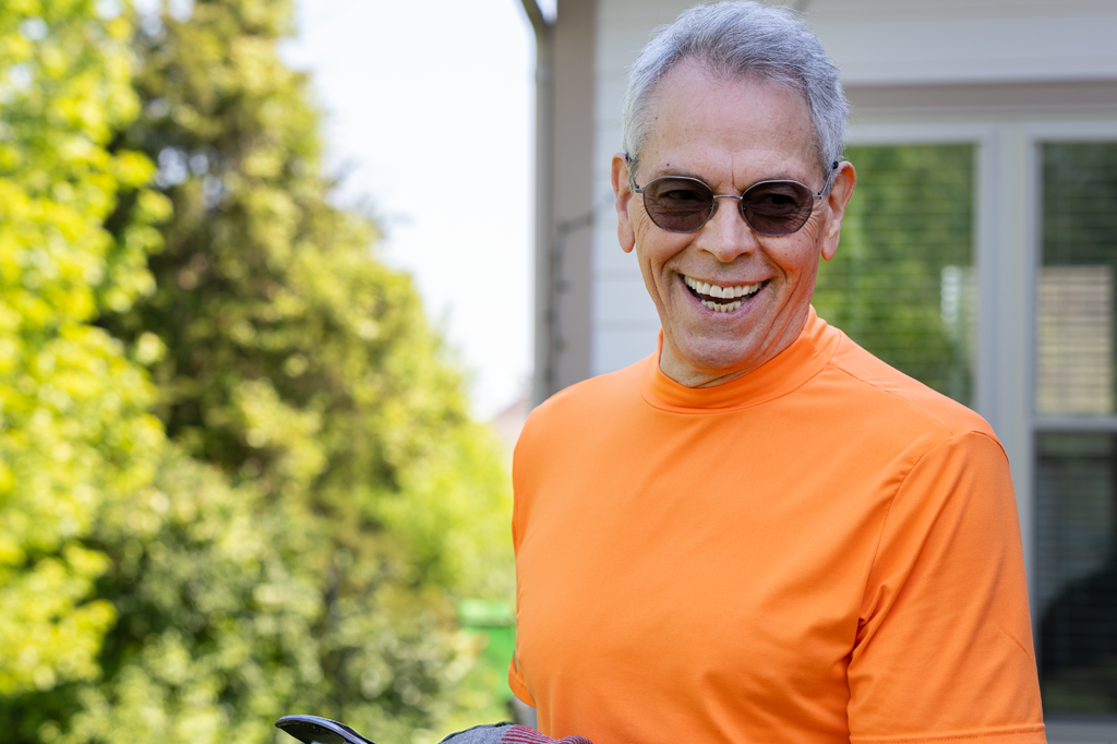 A smiling male senior citizen enjoys retirement living at Bethany Village.